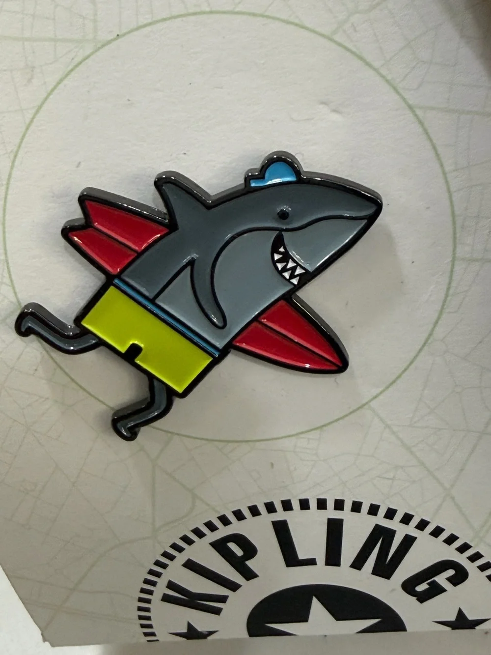 Kipling Shark Enamel Pin — Blue, Red, White